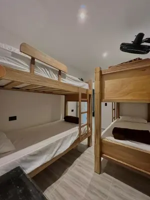 a couple of bunk beds in a room at Casa N-26 Mira in Sopetran