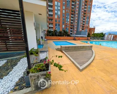 a swimming pool on the roof of a building at Spacious apartment near Lleras and Provenza rentalsOP AN08 in Medellín