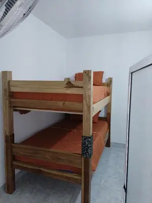 a couple of bunk beds in a room at Casa Zona Rosa in La Dorada