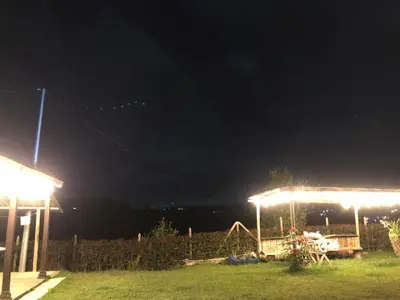 a kite flying in the sky at night at Villa Graciela in Horizonte