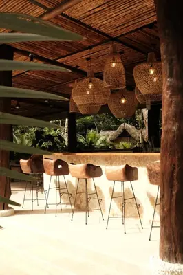 a bar with chairs under a wooden ceiling at Isla Clara Hotel in San Francisco