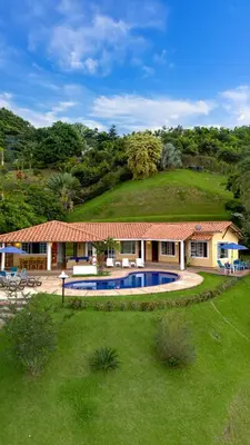 a house with a swimming pool in the yard at Altos de Balaguer in Magallenes