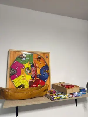 a wooden boat sitting on a shelf with toys at Apartmento 302 t1 Sol de Occidente in Sopetran