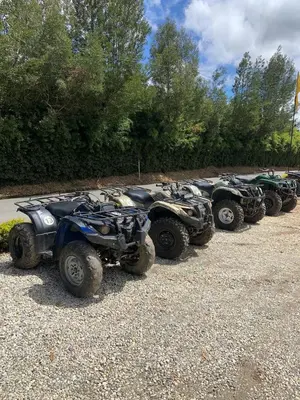 a row of atvs and atvs parked in a row at Sweet Helen Casa Santa in Rionegro
