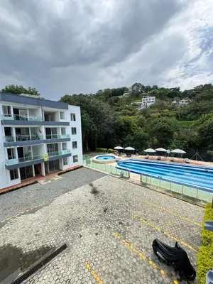 a large swimming pool next to a building at Resort in Sopetrán 402 t5 sol de occidente in Sopetran