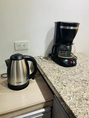 a coffee maker sitting on top of a kitchen counter at Acogedora casa en el carmen de Viboral in Carmen de Viboral