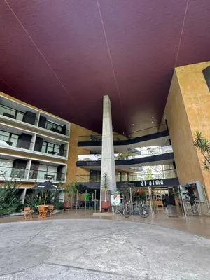 a building with a monument in the middle of it at Hotel Rioverde Suite Cerca de Aeropuerto JMC in Rionegro