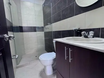 a bathroom with a toilet and a sink and a shower at Apartamento Espacioso Belen Alameda cerca a Laureles y unidad deportiva de Belen in Medellín