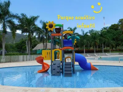 a playground in the water in a swimming pool at Apartasol vacacional con Piscinas en Santa Fe de Antioquia in Santa Fe de Antioquia