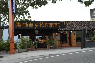 a restaurant with a sign on the front of it at Hotel Boutique El Paisaje in Santa Bárbara