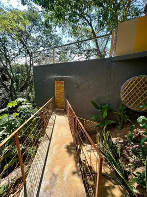 a stairway leading up to a building with a door at Cabaña El Mamoncillo - Jacuzzi Privado con Calefacción y Malla Catamarán - Cerca a Medellín in Sopetran