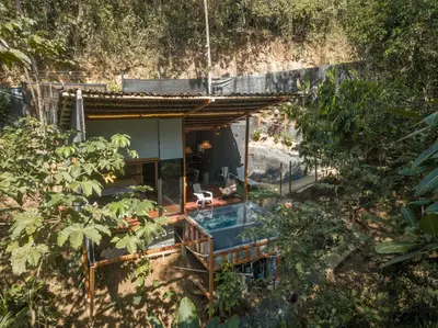an overhead view of a small house in a forest at Cabaña El Bosque - En medio del bosque - Jacuzzi Privado con Calefacción y Malla Catamarán - Cerca a Medellin in Sopetran
