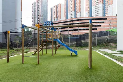 a park with a playground with a slide at Espectacular Habitacion Privada en Apartamento in Medellín