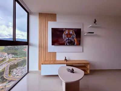 a room with a painting of a tiger on the wall at Nuevo apartamento moderno, espectacular vista in Manizales