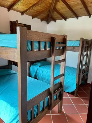 a group of bunk beds in a room at Ranch Style Home Jardin Del Eden in Verdún