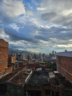 a view of the roofs of buildings in a city at Apartamento Exclusivo con vista panorámica in Medellín