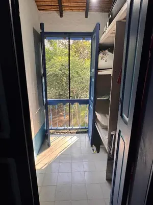 an open door to a room with a view of a kitchen at San José del refugio in Jericó