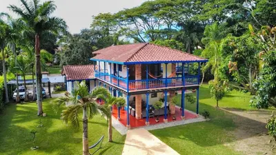 an aerial view of a house with blue trim at San José del refugio in Jericó