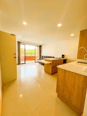 a large room with a large room with a bed at MEDELLIN ALOJAMIENTO EN Laureles in Medellín