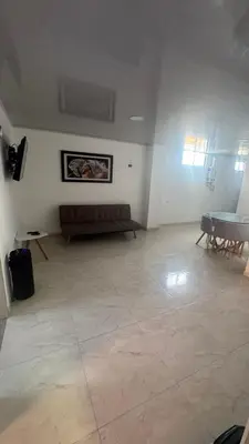 a living room with a couch and a table at torre linares 1 in Manizales