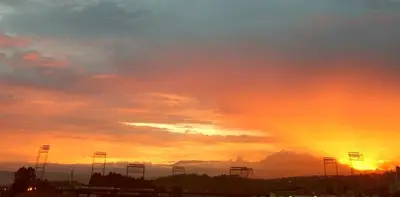 a sunset with a rainbow in the sky at El Mejor Aparta Estudio De La Ciudad in Manizales