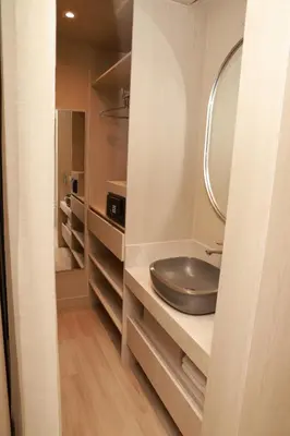 a bathroom with a sink and a mirror at VPV Suites & Casino in Medellín