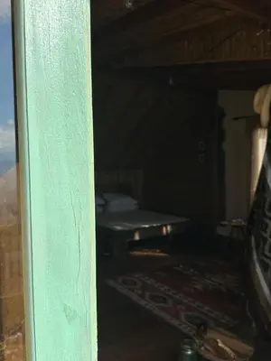 a corner of a room with a bunk bed at Alto Bonito Cabin Salamina in Salamina