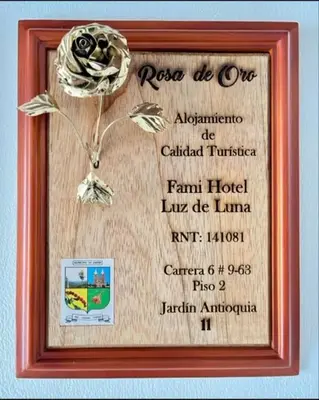 a picture of a certificate in a picture frame at Fami Hotel Luz de Luna in Jardin