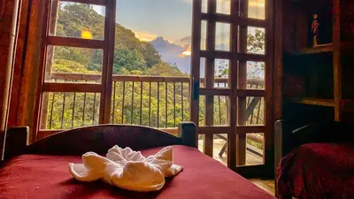 a shell sitting on a table in front of a window at El Santuario Retreat in Guatapé