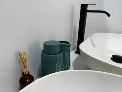 a bathroom with a white toilet and a sink at Luxury estate in San Jerónimo with infinity pool in San Jerónimo
