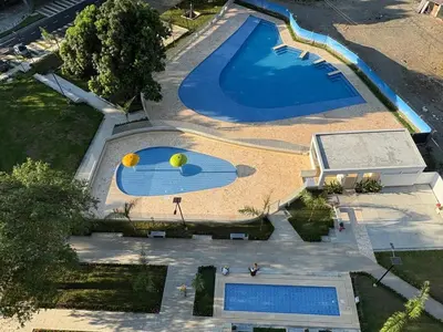 an overhead view of a large swimming pool at Hermoso Apartamento in Santa Fe de Antioquia