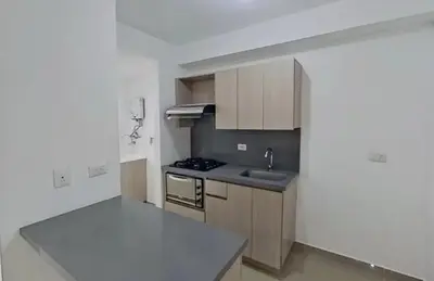 an empty kitchen with a sink and a stove at Hospedaje, Nórdica,Medellin,Turosmocolombia-fit in Bello