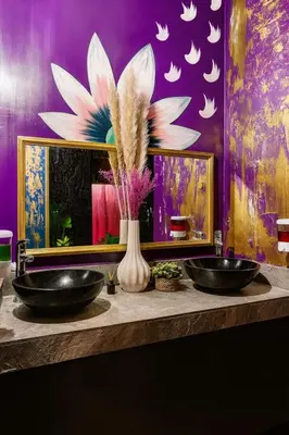 two sinks in a bathroom with a purple wall at Casa amplia con estilo, poblado, disco y AC in Medellín