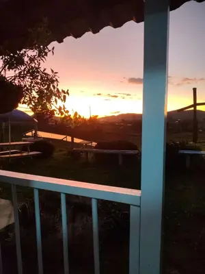 a view of a sunset through a window at Lactesano es Vida in La Unión
