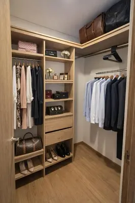 a walk in closet with wooden shelves and shoes at Envigado Luxury Stay - Apartment in City Plaza in Envigado