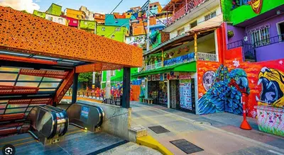 a painting of a street with buildings with graffiti at Envigado Luxury Stay - Apartment in City Plaza in Envigado