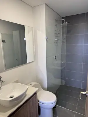 a bathroom with a sink and a toilet and a shower at Envigado Luxury Stay - Apartment in City Plaza in Envigado