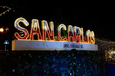 a sign that says santa clara is lit up at Hotel Restaurante La Costica Dulce in San Carlos