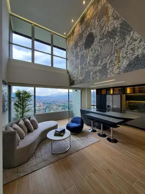 a living room with a couch and a pool table at El Poblado Two-Level Luxury Penthouse Amazing View in Medellín
