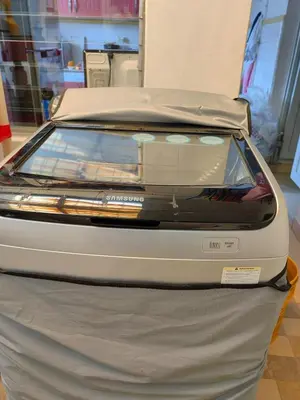 a car is sitting on top of a bed at Quiet space near Nórdica with parking in Bello