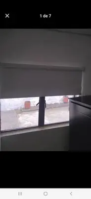a view of a window with a blind at Casa estrella in Manizales