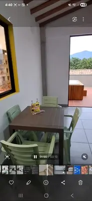 a dining room with a table and chairs in a room at Apartamento en Santa Fe de Antioquia con jacuzzi in Santa Fe de Antioquia