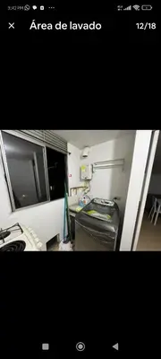 a picture of a room with a desk and a television at Apartamento en excelente ubicación en el Poblado para renta con estadía mínima de 1 mes in Medellín