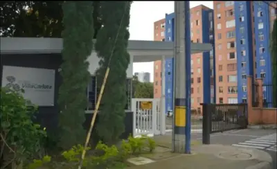 a bus stop in a city with tall buildings at El mejor sector del Poblado para estancia mínima de 1 mes in Medellín