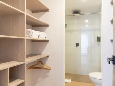 a bathroom with a toilet and a shower at NOK Spectacular 3 BR w Balcony in Laureles Medellin in Medellín