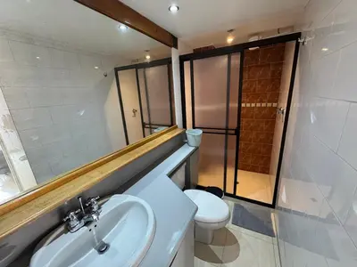 a bathroom with a sink and a toilet at Relaxing appartement in the middle of Poblado in Medellín