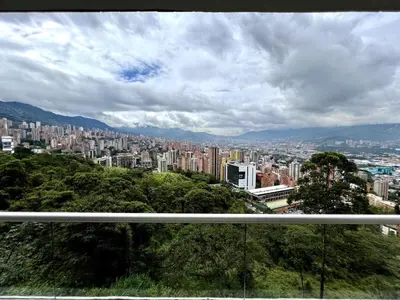 a view of a city with buildings in the distance at PANORÁMIKA - Unique 1BD 1 and half Bath Best views Long term in Medellín
