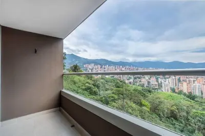 a balcony with a view of a city at PANORÁMIKA - Unique 1BD 1 and half Bath Best views Long term in Medellín