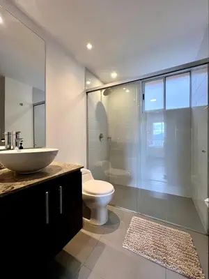 a bathroom with a sink and a toilet and a shower at PANORÁMIKA - Unique 1BD 1 and half Bath Best views Long term in Medellín