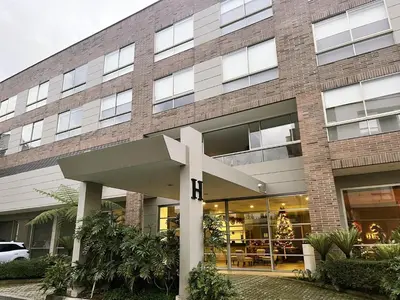 a large building with a cross in front of it at Private 1BR 2Bed AC Suite | Llanogrande Airport in Rionegro